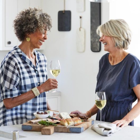 Two Women Laughing, Cheese Wine Plate